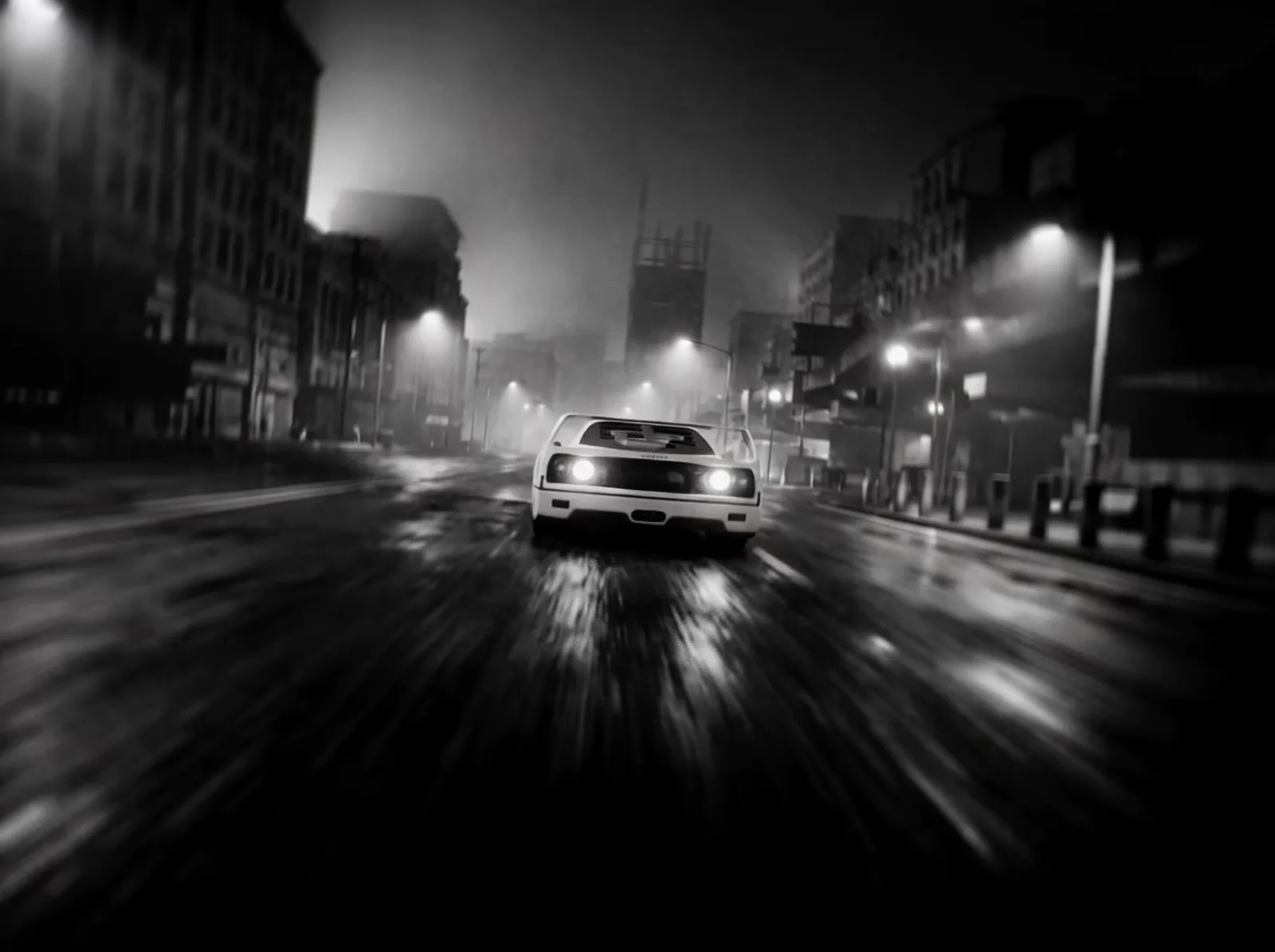 White sports car at night, black and white